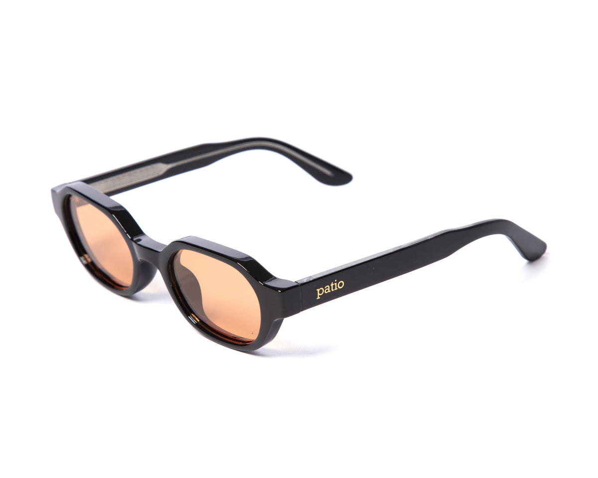Black x Orange — three quarter view from above